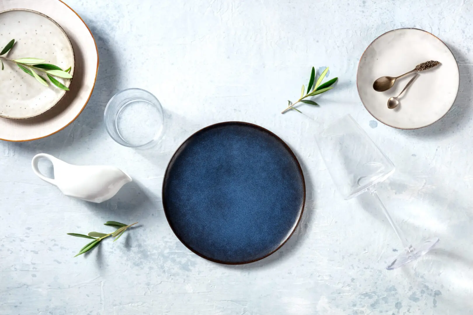 A blue plate sitting on top of a table.