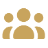 Three gold-colored person icons arranged in a group, with one larger icon in front and two smaller icons behind it, on a light background—perfect for representing your team or organization at your Showroom Houston location.