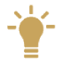 Gold light bulb icon with five rays radiating outward, set against a light gray background—a perfect symbol for inspiration and innovation at your next showroom in Houston.